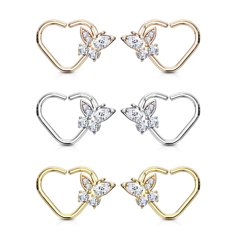 Piercing all'orecchio a forma di cuore con farfalla