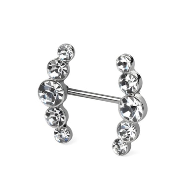 Piercing al capezzolo con due archi di pietre