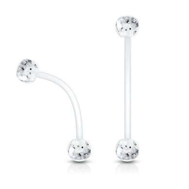 Piercing all'ombelico con sfere glitterate per gravidanza