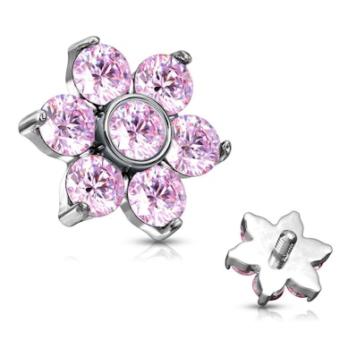 Dermal anchor con fiore incastonato di pietre.
