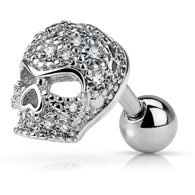 Piercing all'orecchio con teschio