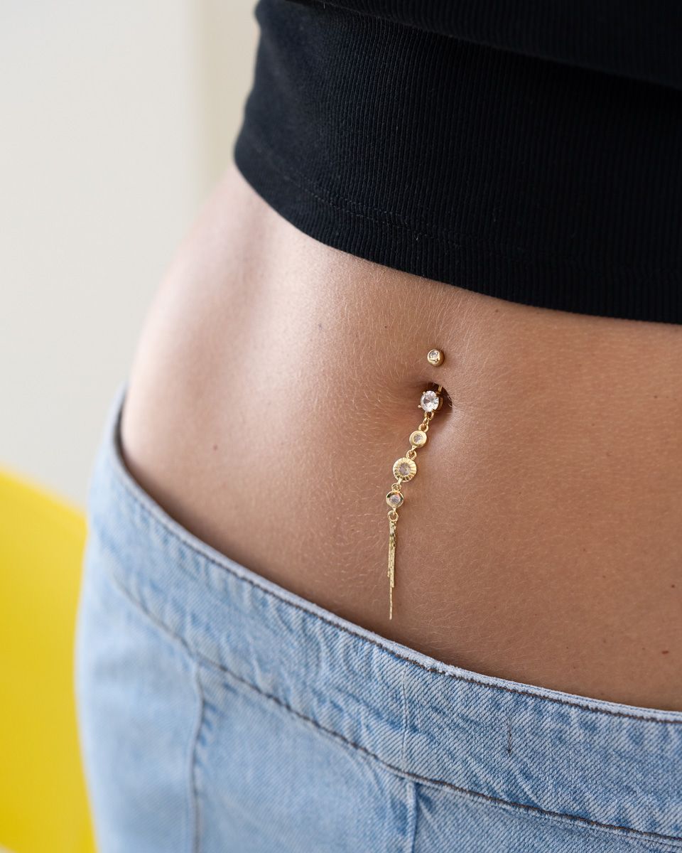 Piercing all'ombelico con elegante pendente con dischi