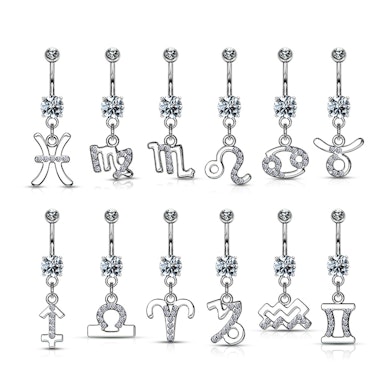 Piercing all'ombelico con segno zodiacale