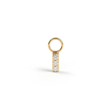 Charm semplice in titanio con tre pietre