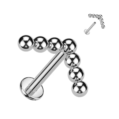 Labret in titanio con top di sfere a V