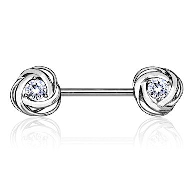 Piercing per il seno con rose e pietre