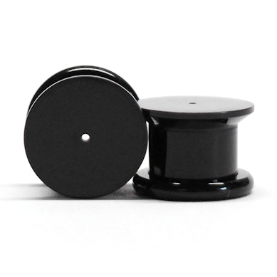 Plug in acrilico per piercing all'orecchio.