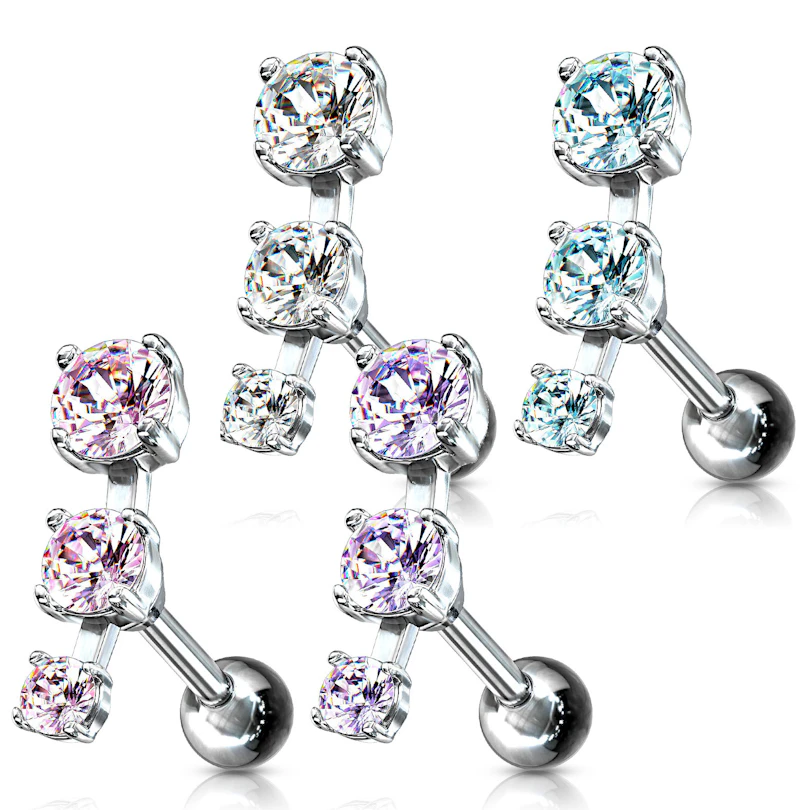 Piercing all'orecchio con tre pietre in fila