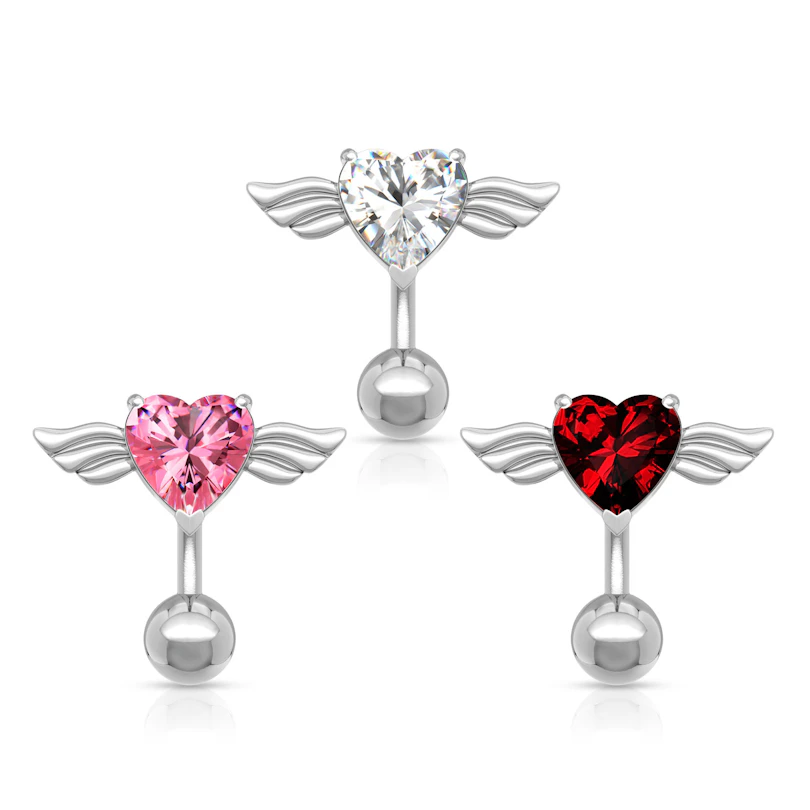 Piercing all'ombelico inverso con cuore e ali