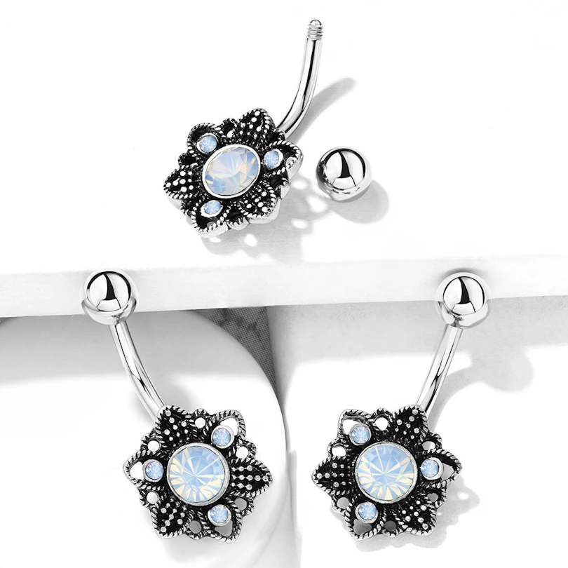 Piercing all'ombelico con fiore ossidato e opalite