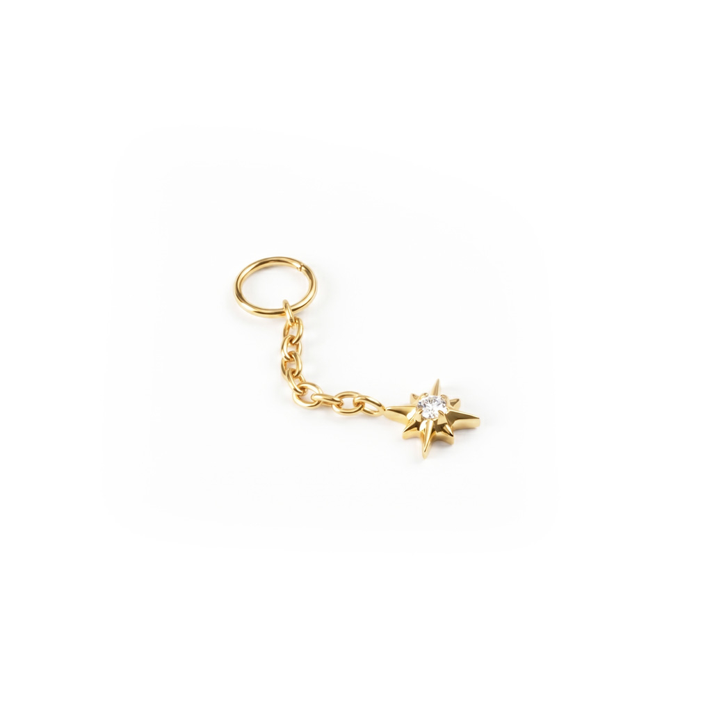 Charm con stella e pietra centrale