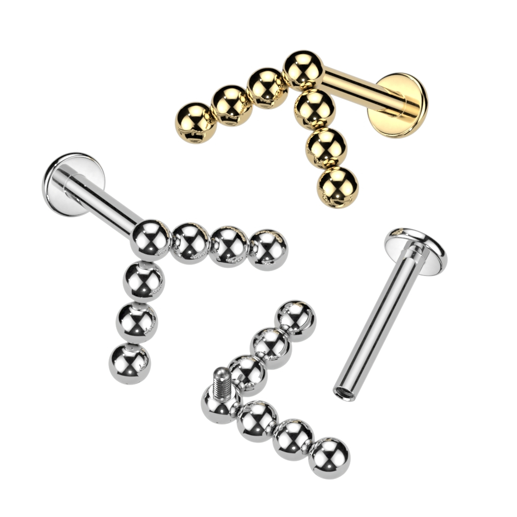 Labret in titanio con top di sfere a V