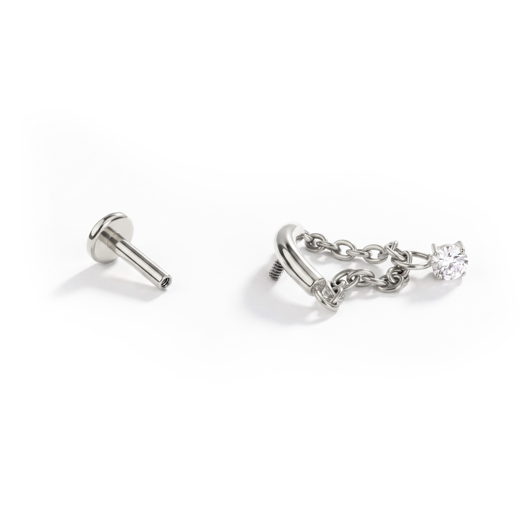Labret con barretta curva e pietra pendente da catenella