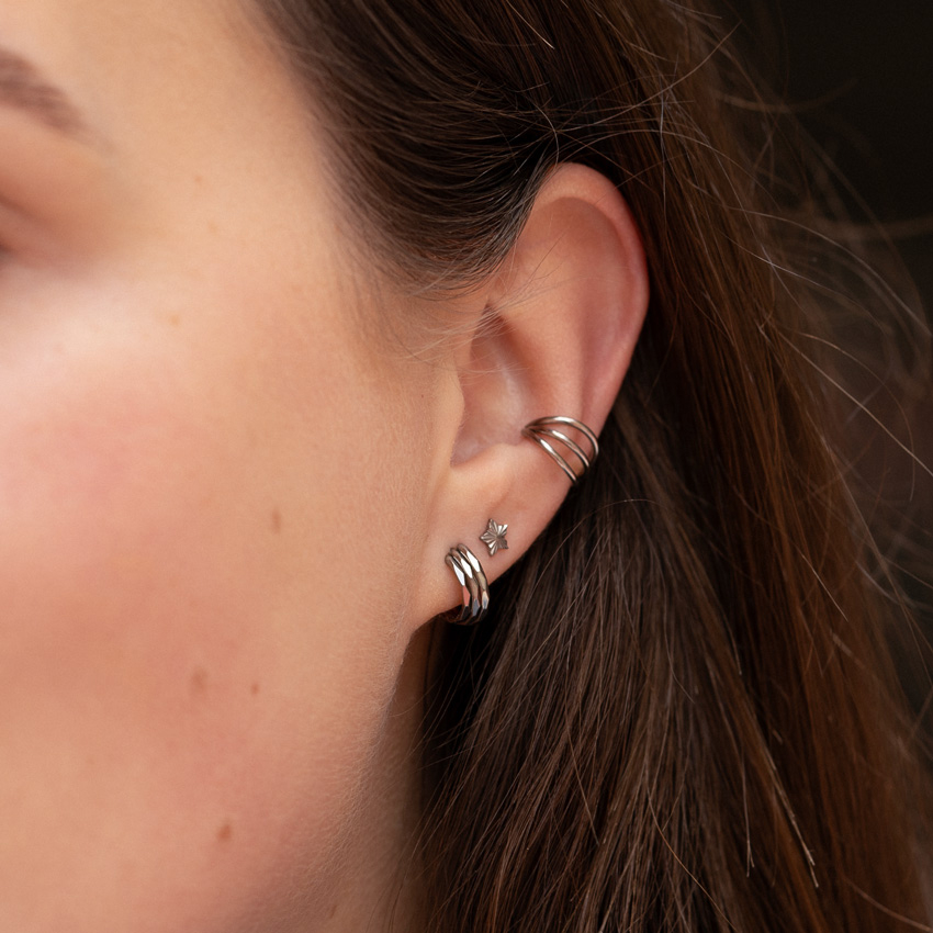 Labret in titanio con top a stella e design strutturato