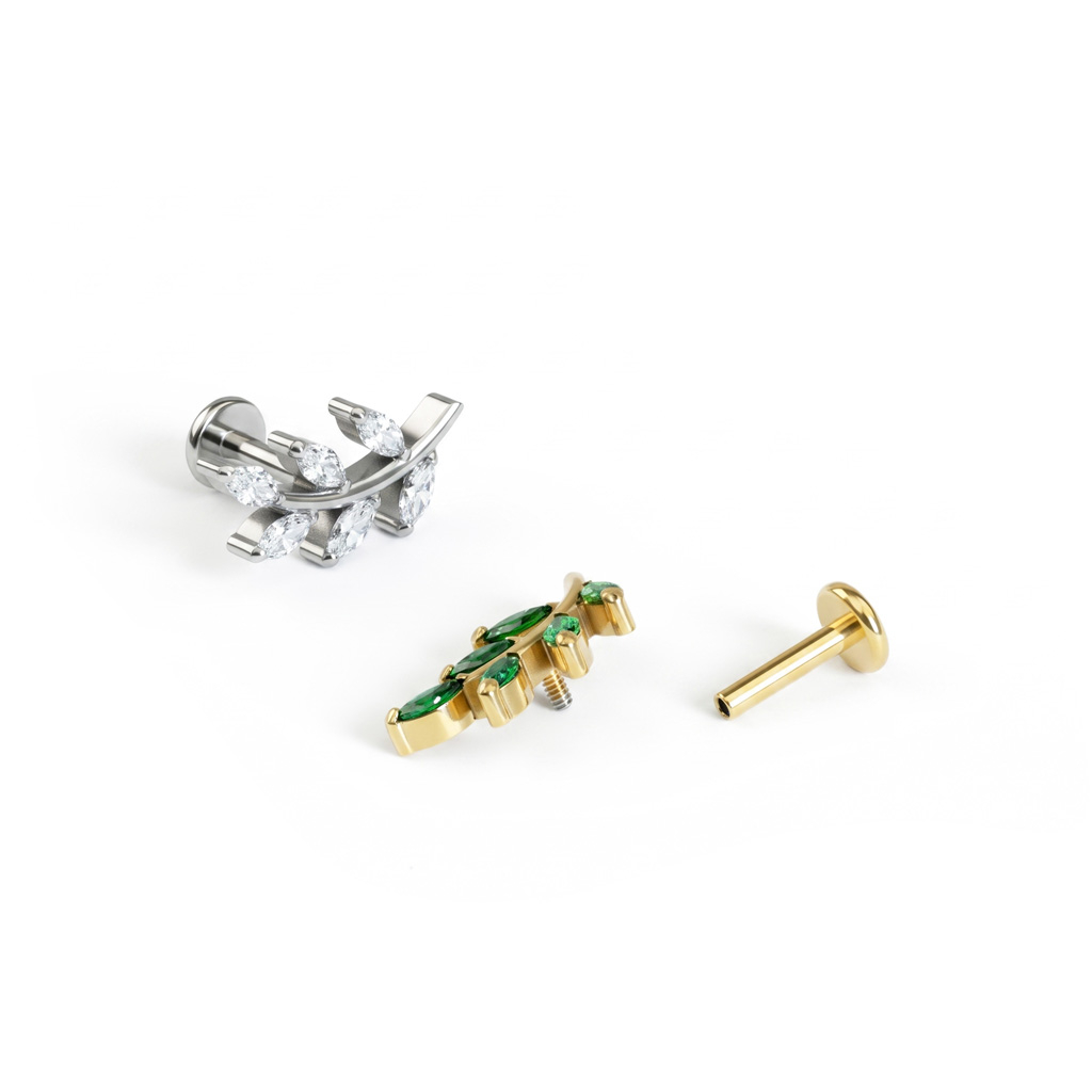 Labret in titanio con foglia e pietre