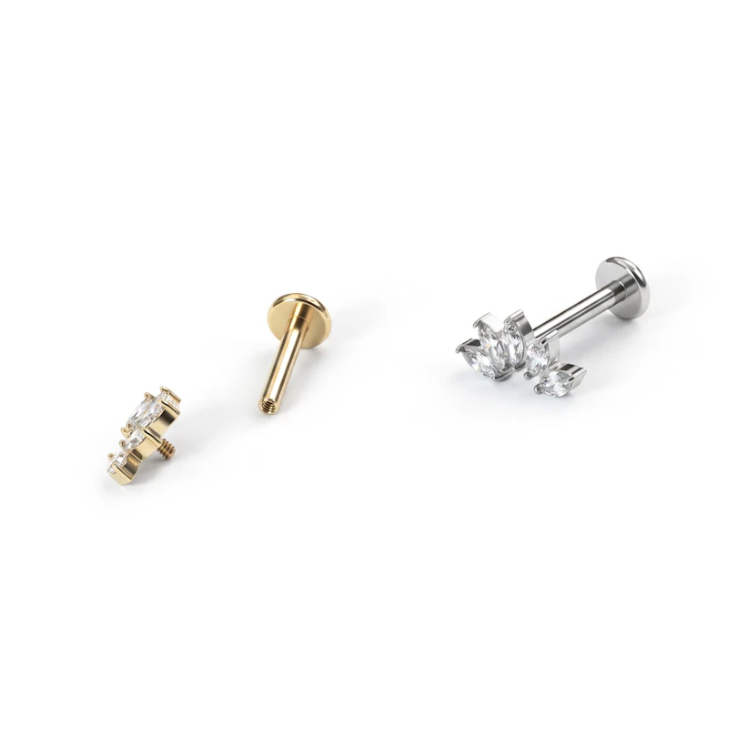 Labret dal top curvo in titanio con 5 pietre