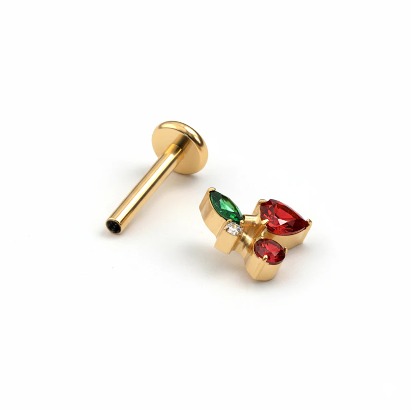 Labret con ciliegie e pietre colorate