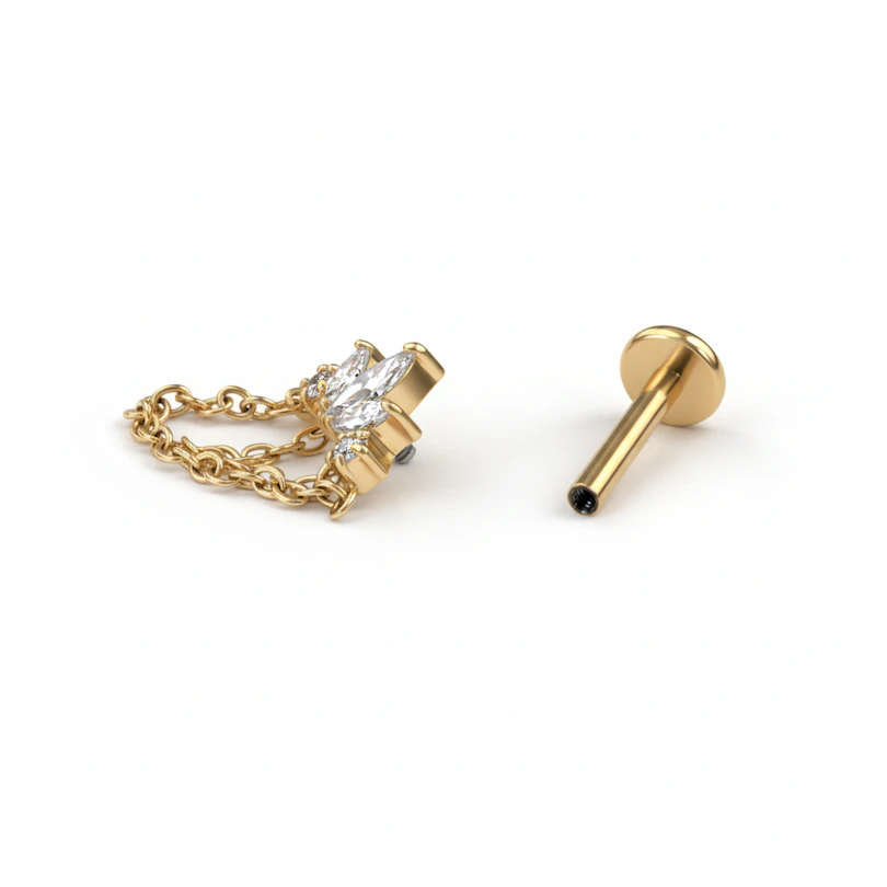Labret in titanio con pietre e catene