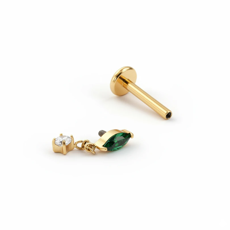 Labret in titanio con pietra color smeraldo e pendente