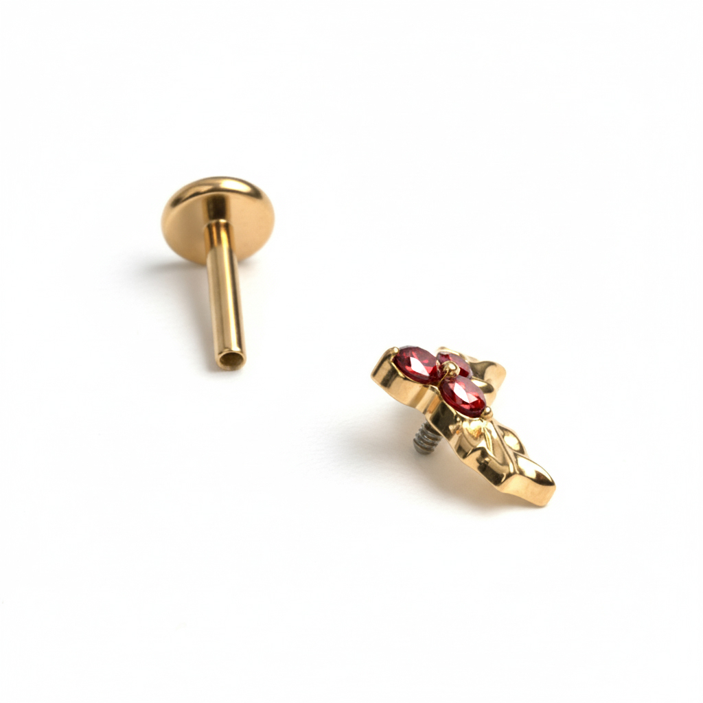 Labret in titanio con foglie natalizie