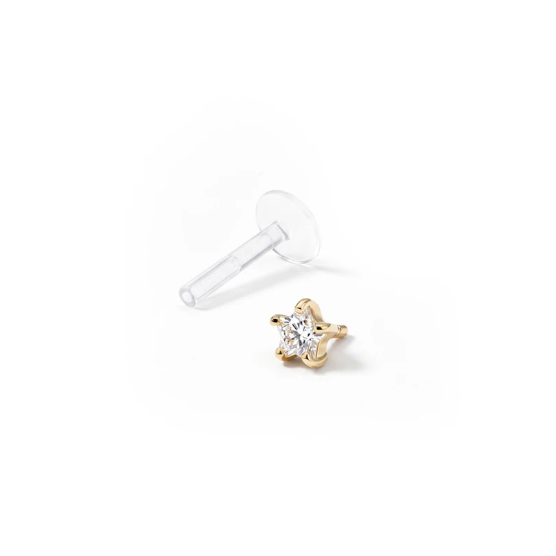 Labret in oro 14 carati con pietra a stella e barra in ptfe