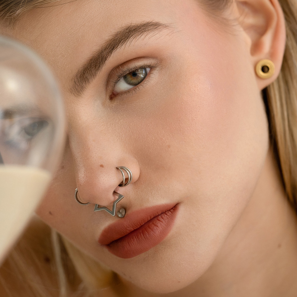 Cerchio clicker in titanio a forma di stella